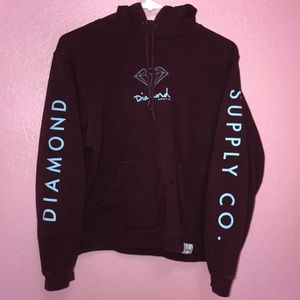 Maroon diamond hoodie with blue letters